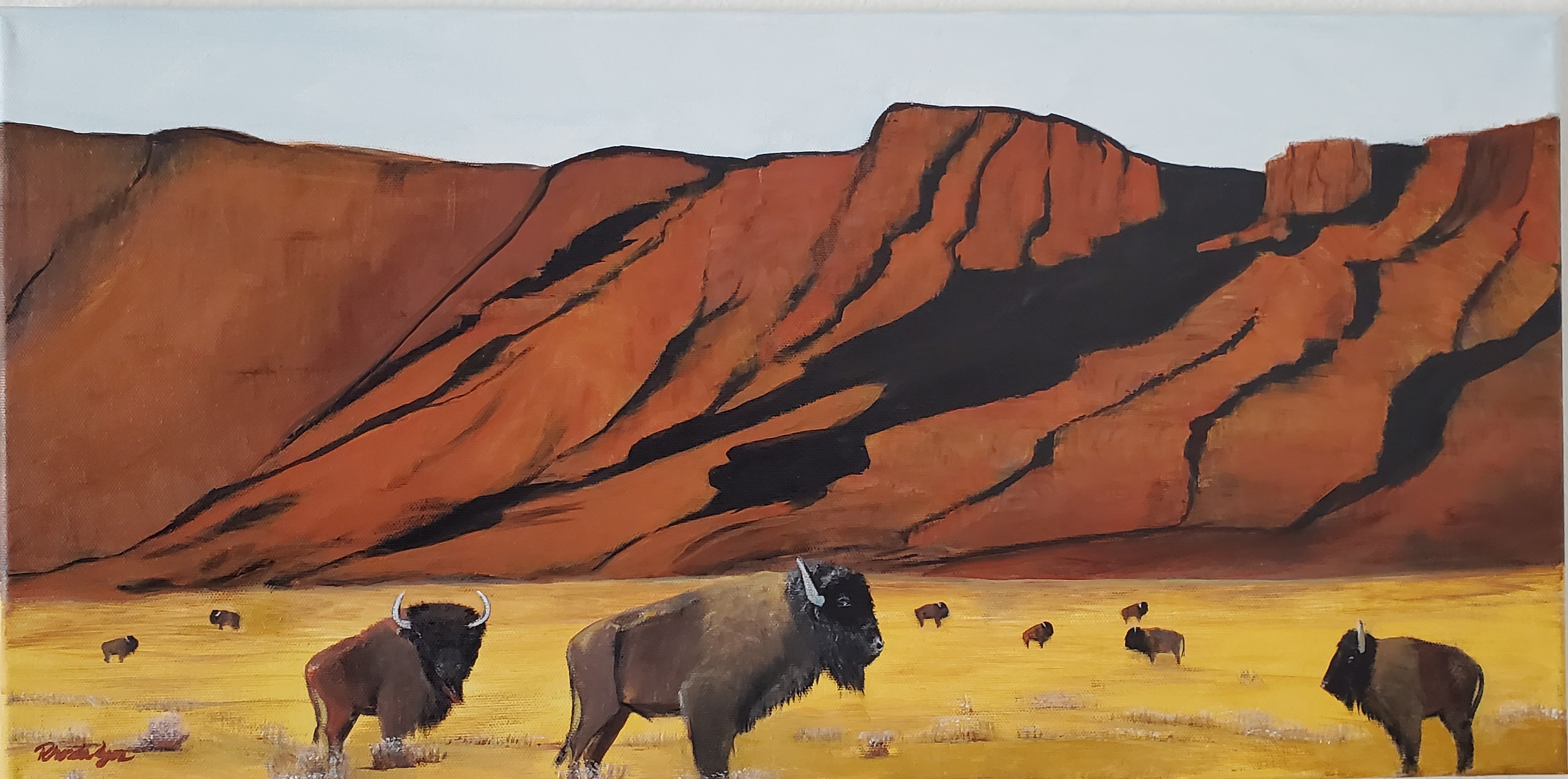 Acrylic painting of a bison herd in a Southwest red rock desert landscape